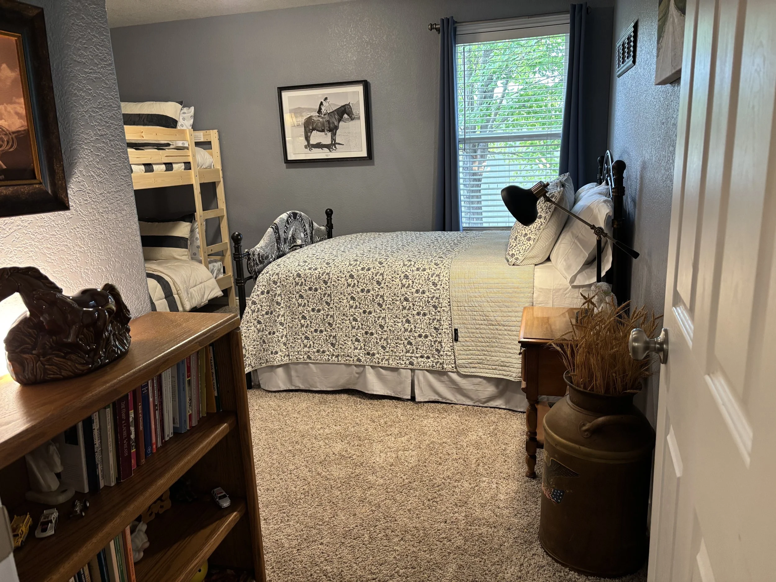 Bedroom #3 with a full bed and twin bunk beds