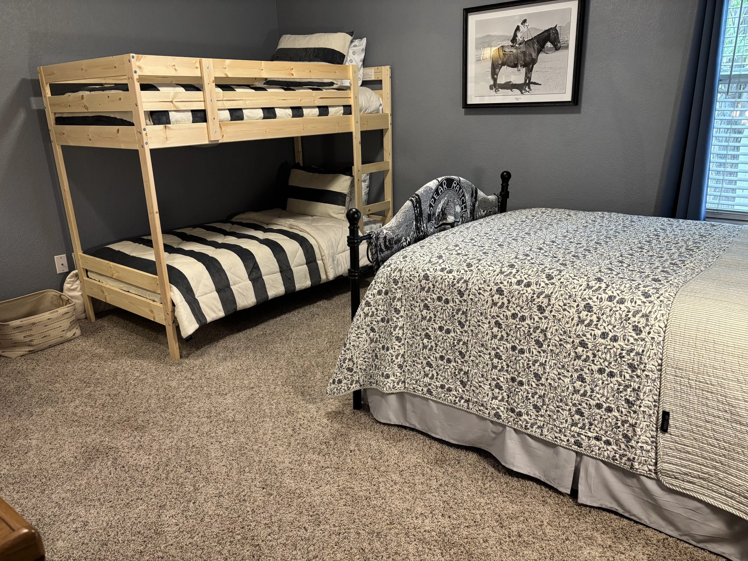 Bedroom #3 with a full bed and twin bunk beds