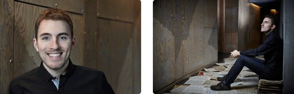 A smiling man in a black shirt with a striped collar in a professional setting, and another man in a black shirt sitting on the floor with newspapers, in a somber, artistic setting.