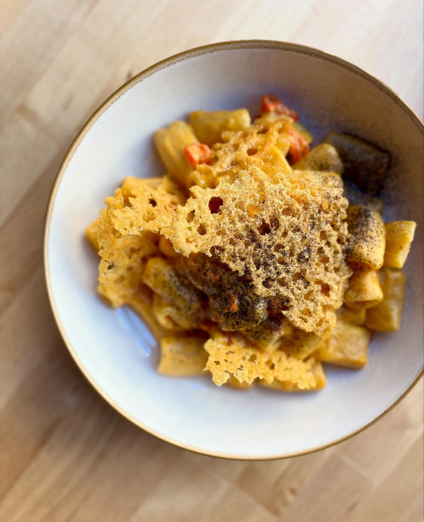 Rigatoni with Aleppo &amp; Habanada pepper soubise, parm frico, leek ash 

Hits the menu in Queen Anne tomorrow 😏🍁

#rigatoni #habanada #parmesanfrico #seattlepasta #fallpasta #pepperseason #washingtonpeppers
