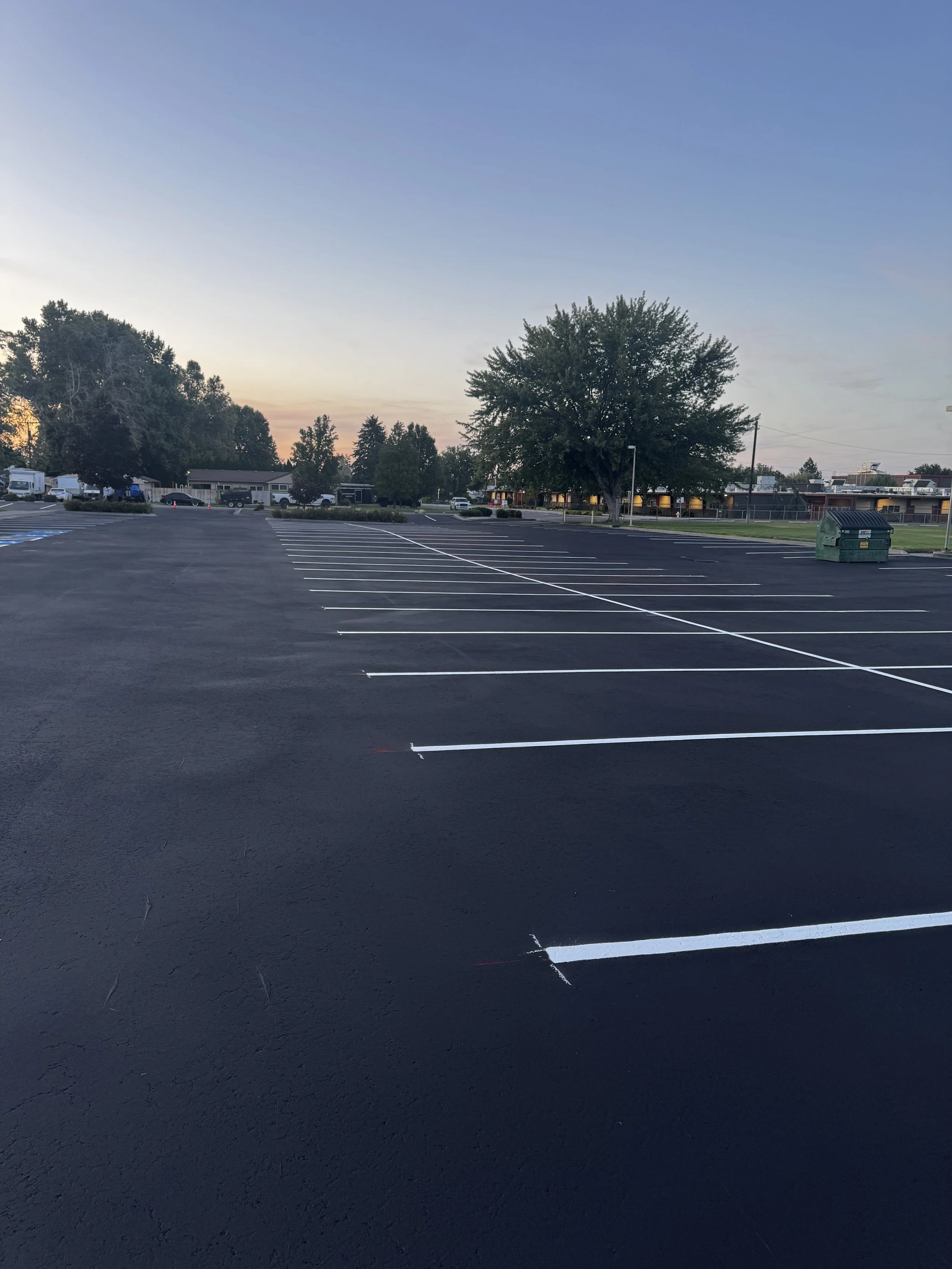 Freshly sealcoated Parking Lot with fresh new white lines