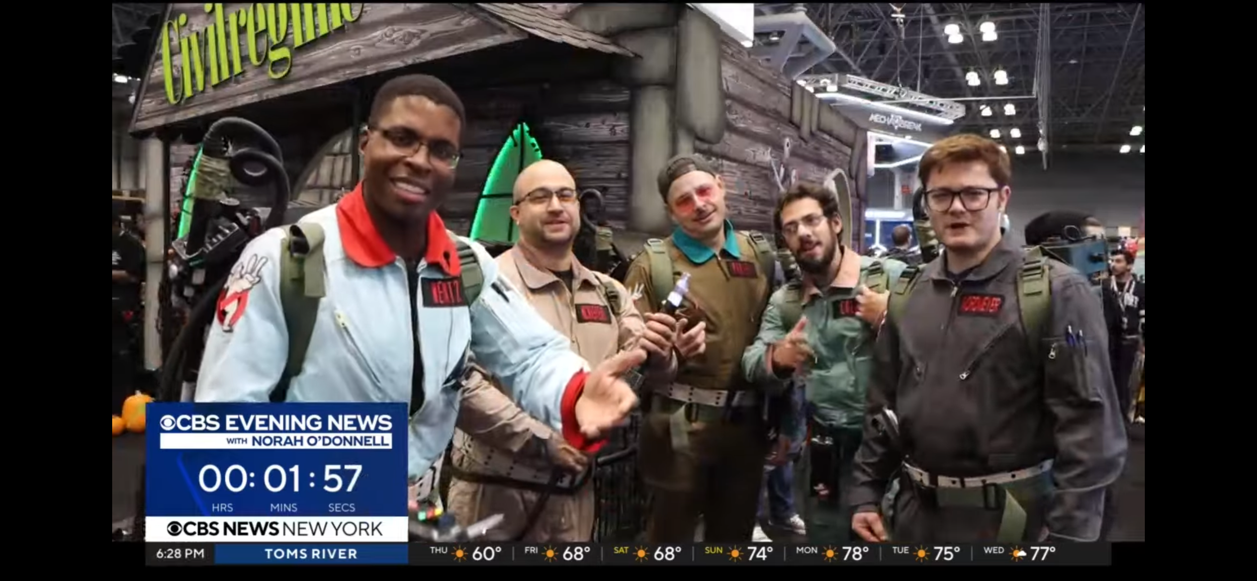 New York Comic Con 2024, men dressed as ghostbusters characters on the CBS news outside of the Civil Regime booth. Event production and marketing by Laura Alyse Rubin.