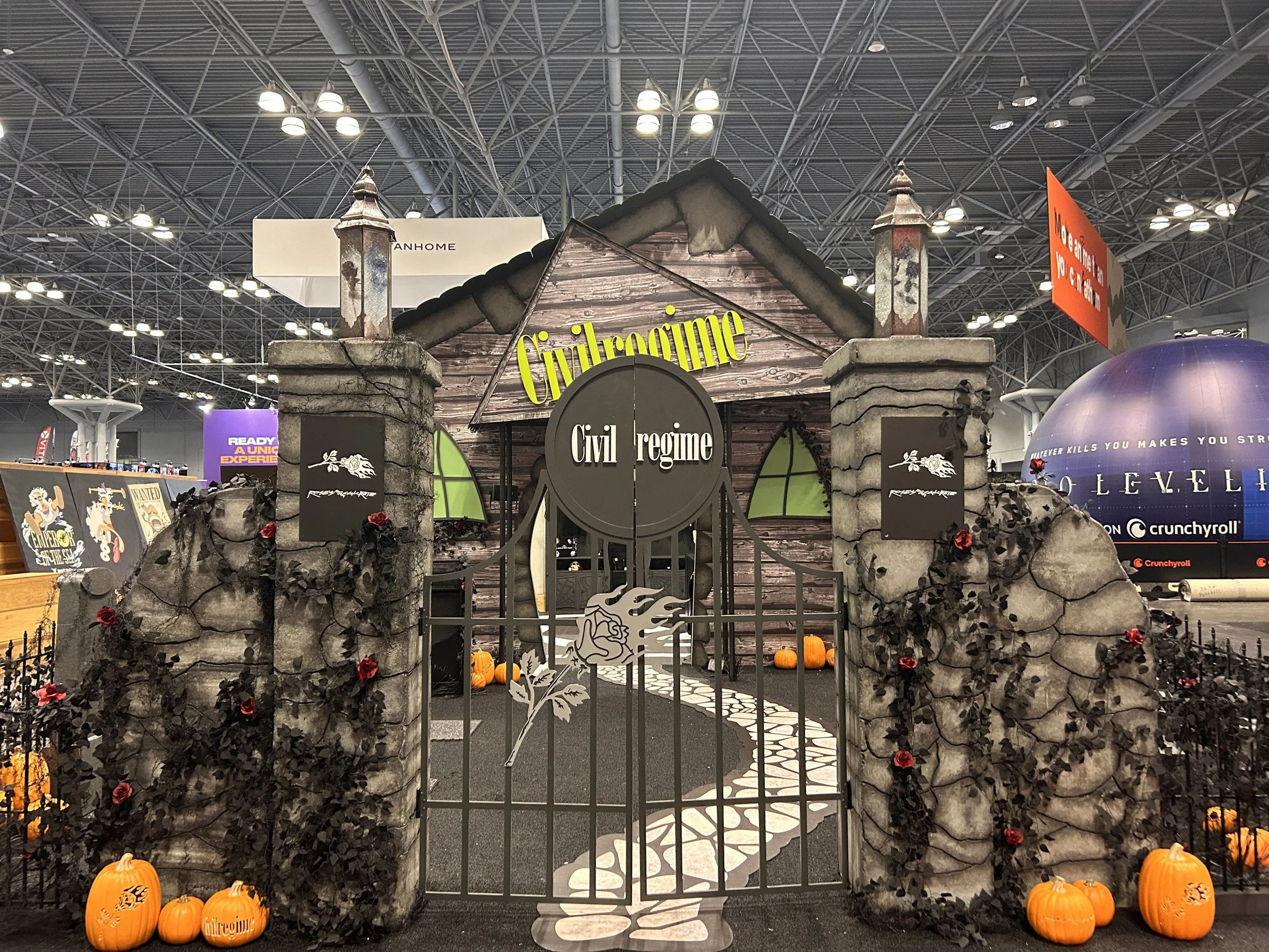 New York Comic Con 2024 booth activation for "Civil Regime" with large gates. A Nightmare Before Christmas themed Halloween booth activation. Event production and marketing by Laura Alyse Rubin.