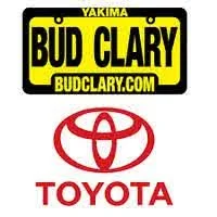 A sign with the text 'Yakima Bud Clary' and the website 'budclary.com' along with a Toyota logo and the word 'Toyota' in red.