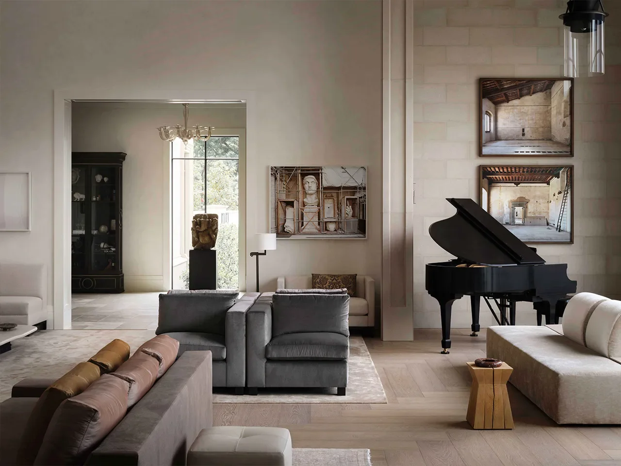 Living room with black grand piano, gray couches, beige modern sofa, artwork, and large windows with natural light.