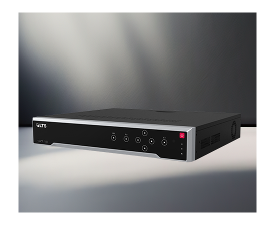 A black and silver GTLS device with multiple input ports and indicator lights on the front, resting on a gray surface with a gradient gray background.