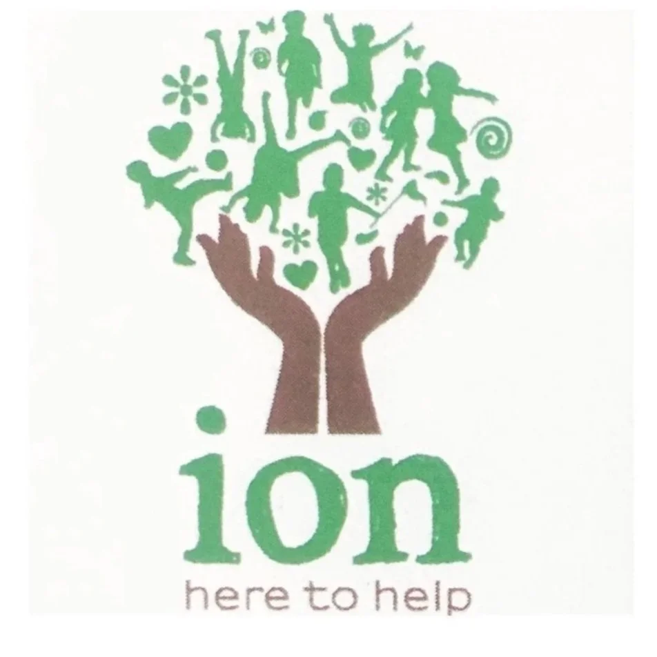 Logo with two hands holding a circle of green silhouettes of children, hearts, and flowers, with text 'ion here to help' beneath.