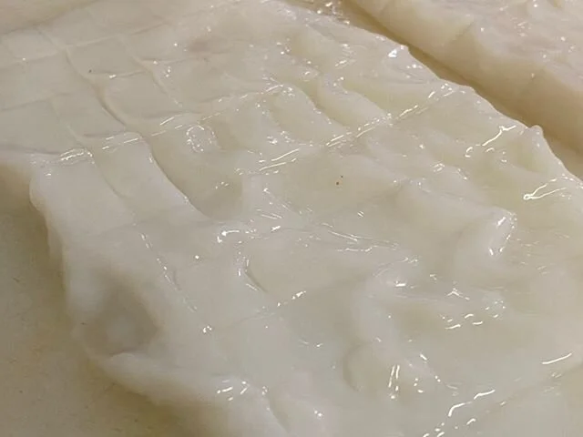 Pounded and scored calamari.