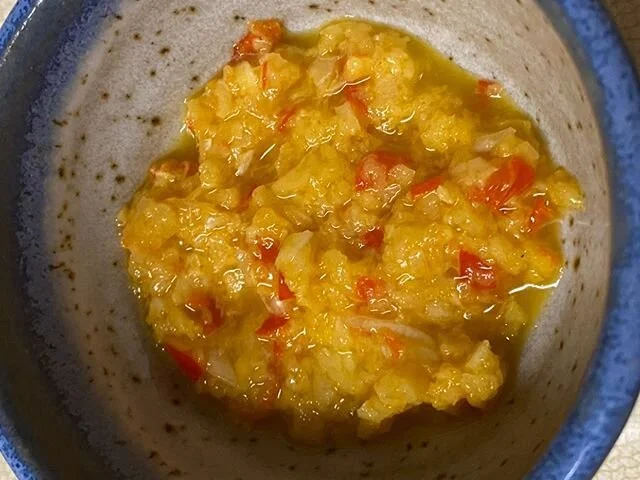 Sweet ginger and garlic sauce made with a mortar and pestle.