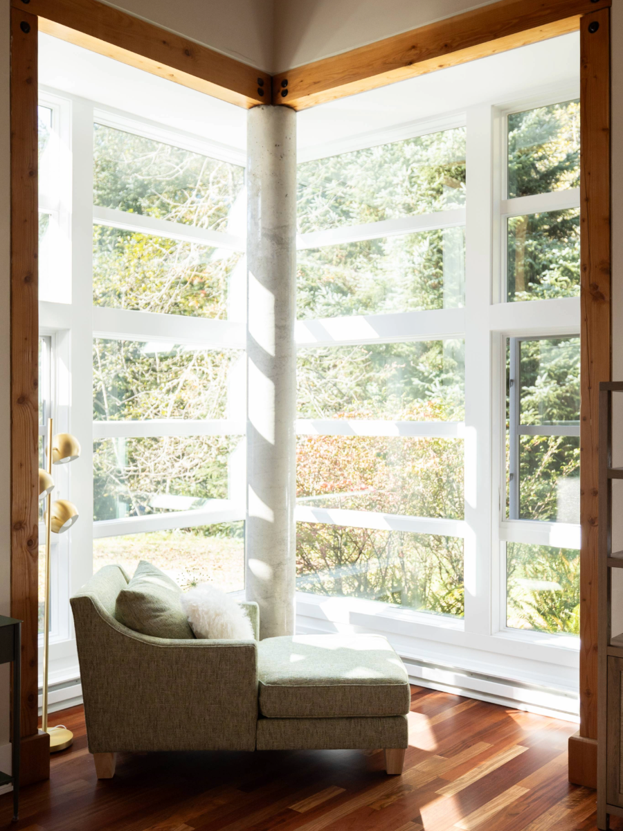 Furnished meditation pavilion interior with upholstered lounge chair at CCA Caring Cabin Oregon Coast by Design With Refinement 