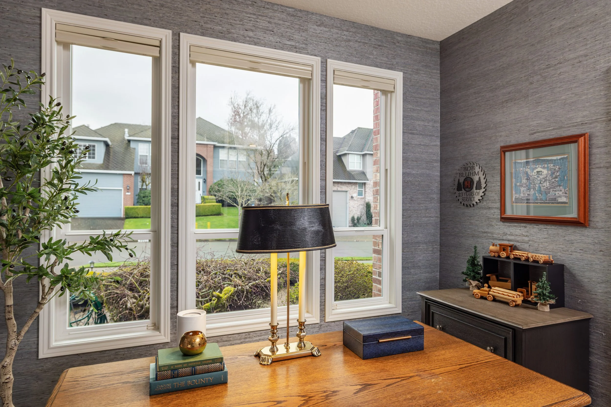 Office space with blue sisal grasscloth