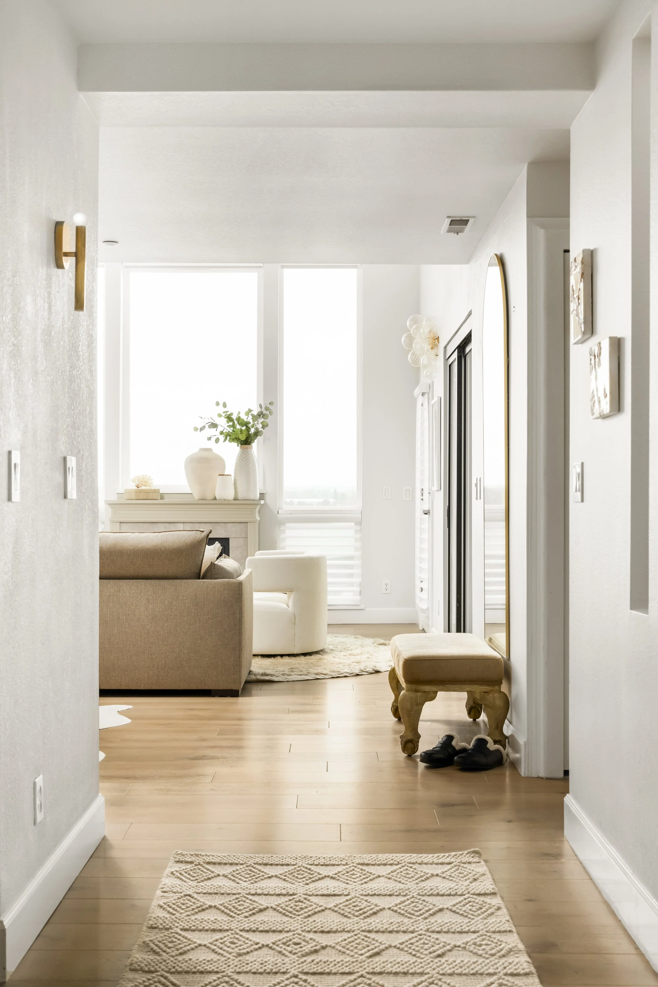 Entry hallway of Vancouver WA waterfront condo interior design by Design With Refinement Portland
