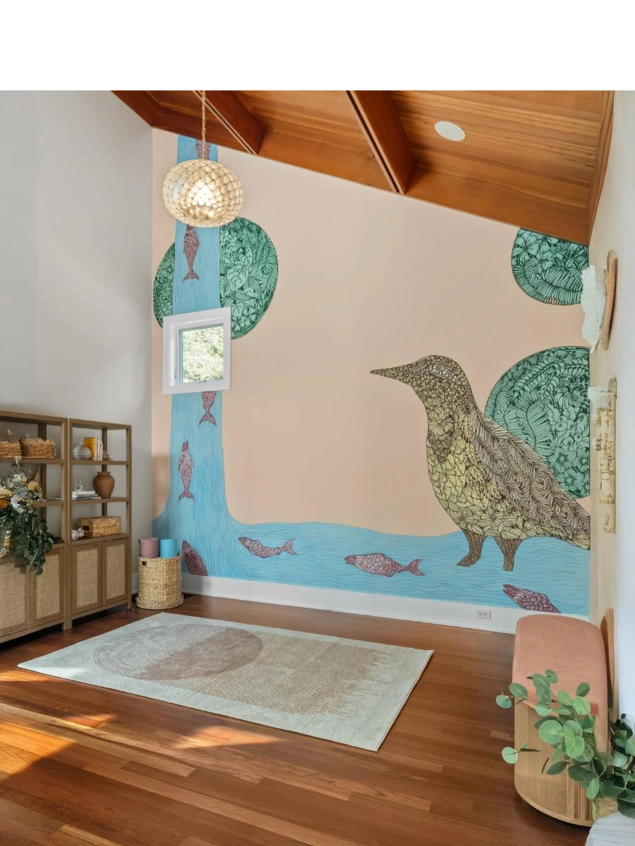 Interior view of a mural with a bird, stream with fish in peach, blues and greens