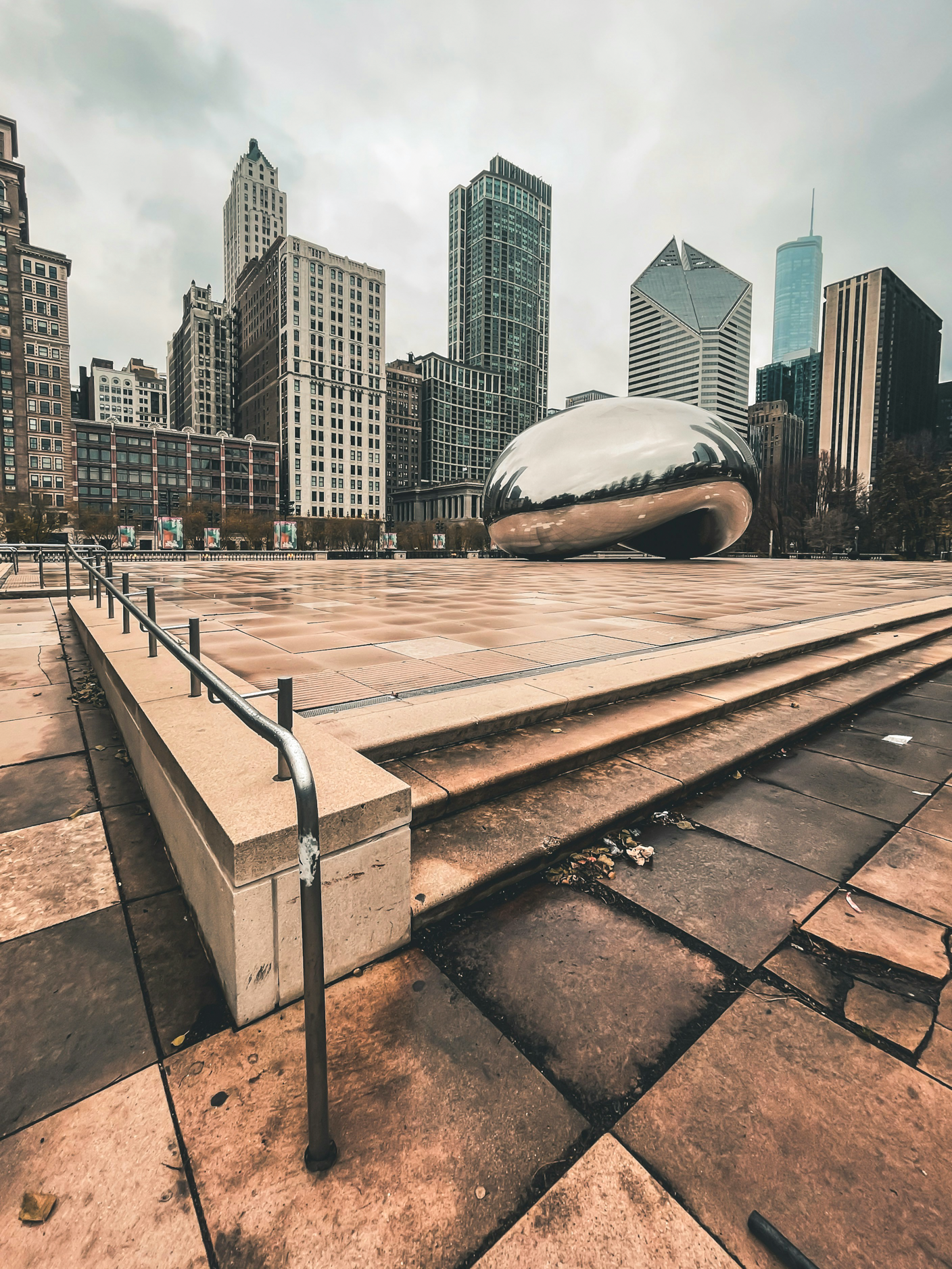 Street-level perspective of downtown Chicago’s Millennium Park, featuring Cloud Gate and the city’s architectural backdrop—highlighting the intersection of place, culture, and commercial potential.