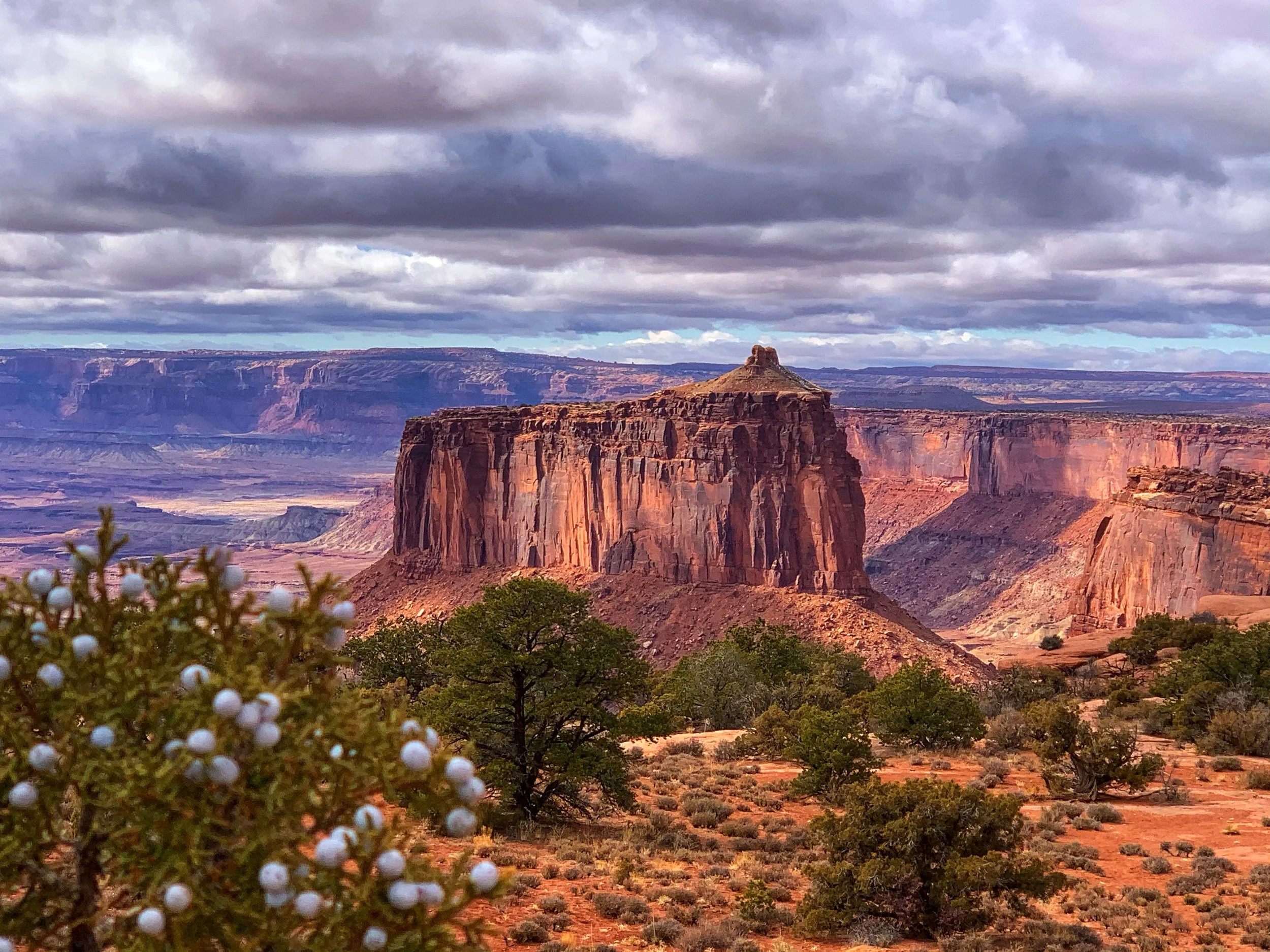 Canyonlands National Park monument with cloudy skies