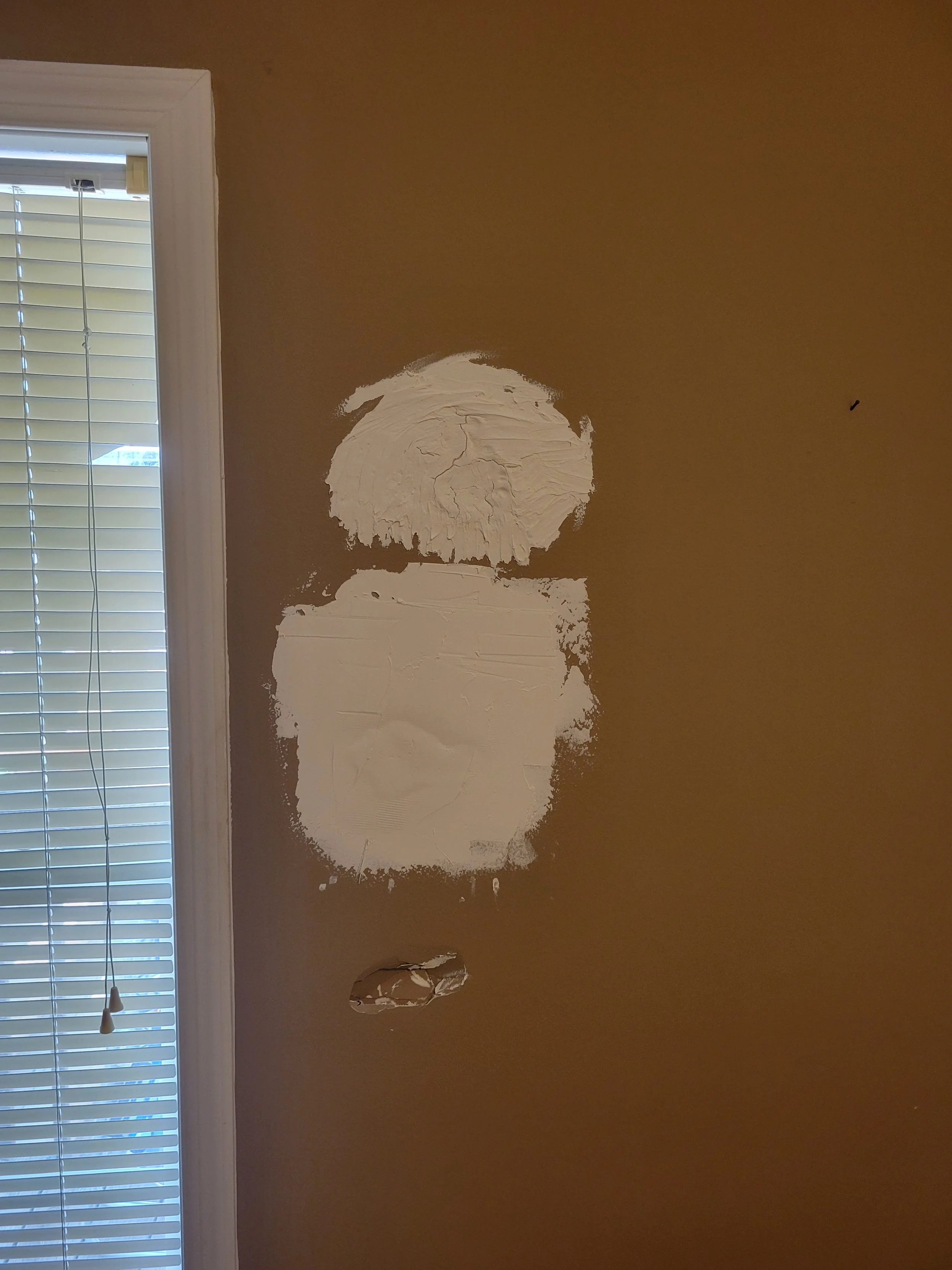 Customers tried to repair a few holes in the drywall without success.