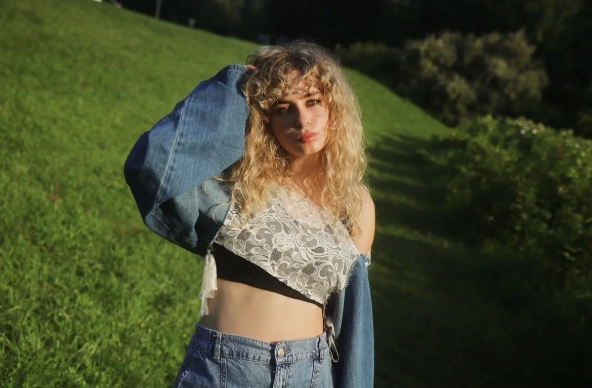 This piece draws inspiration from the contrast between denim and lace. I deconstructed a pair of jeans, repurposing the pant legs as sleeves, while the lace was sourced from a secondhand shirt.