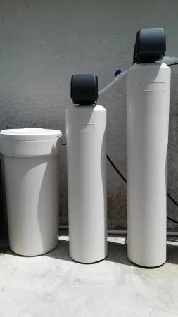 Southwest Florida well water system with aeration, sulfur and iron filters, and softener to remove rotten egg smell, sulfur odor, iron stains, hardness, bacteria, and discoloration. RO for drinking water.