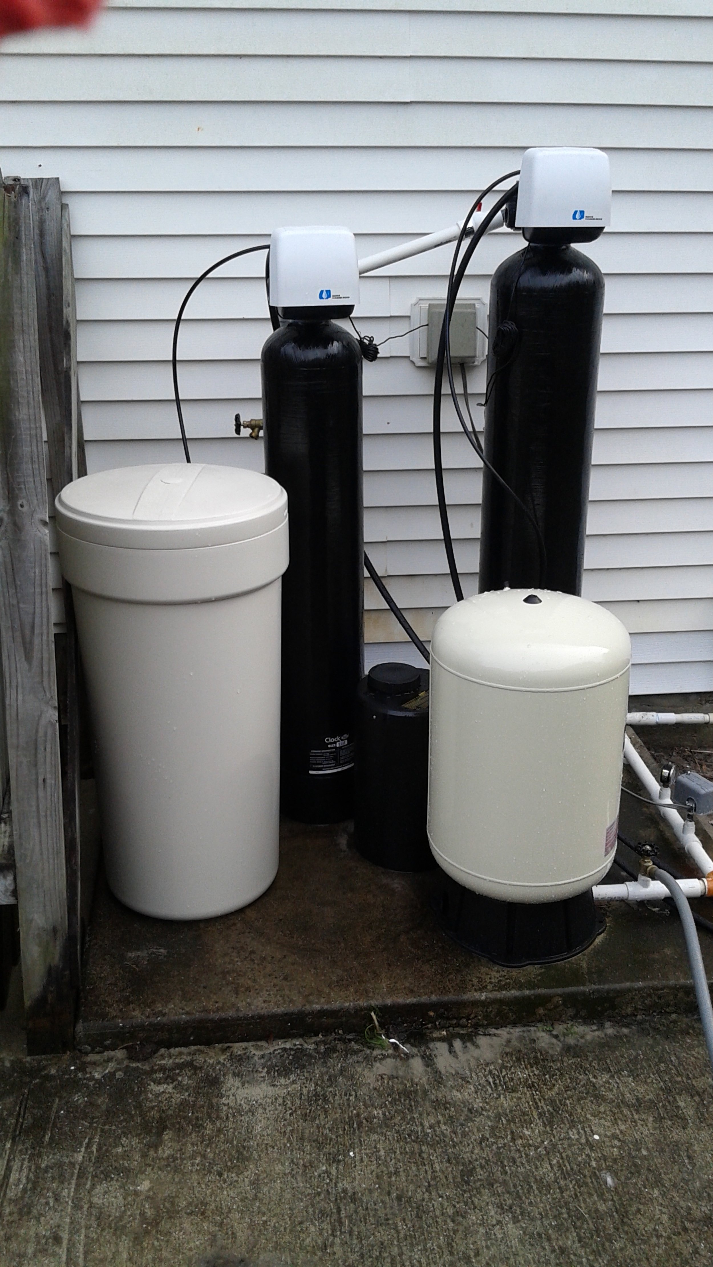 Southwest Florida well water system with aeration, sulfur and iron filters, and softener to remove rotten egg smell, sulfur odor, iron stains, hardness, bacteria, and discoloration. RO for drinking water.