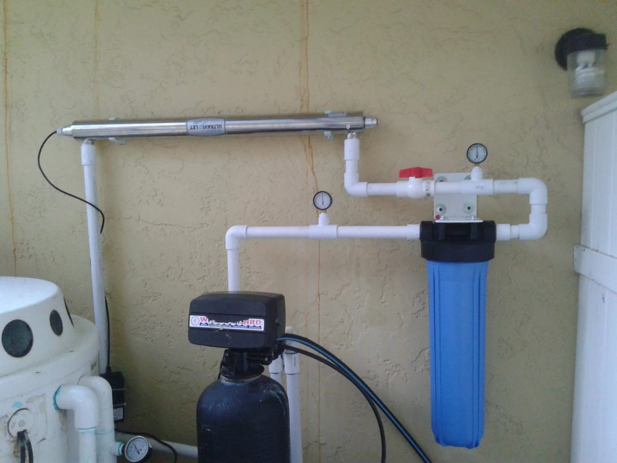 Whole house well water treatment including aeration, sulfur and iron filters, and a softener to fix rotten egg smell, sulfur odor, iron stains, hardness, and bacteria. RO for drinking water.