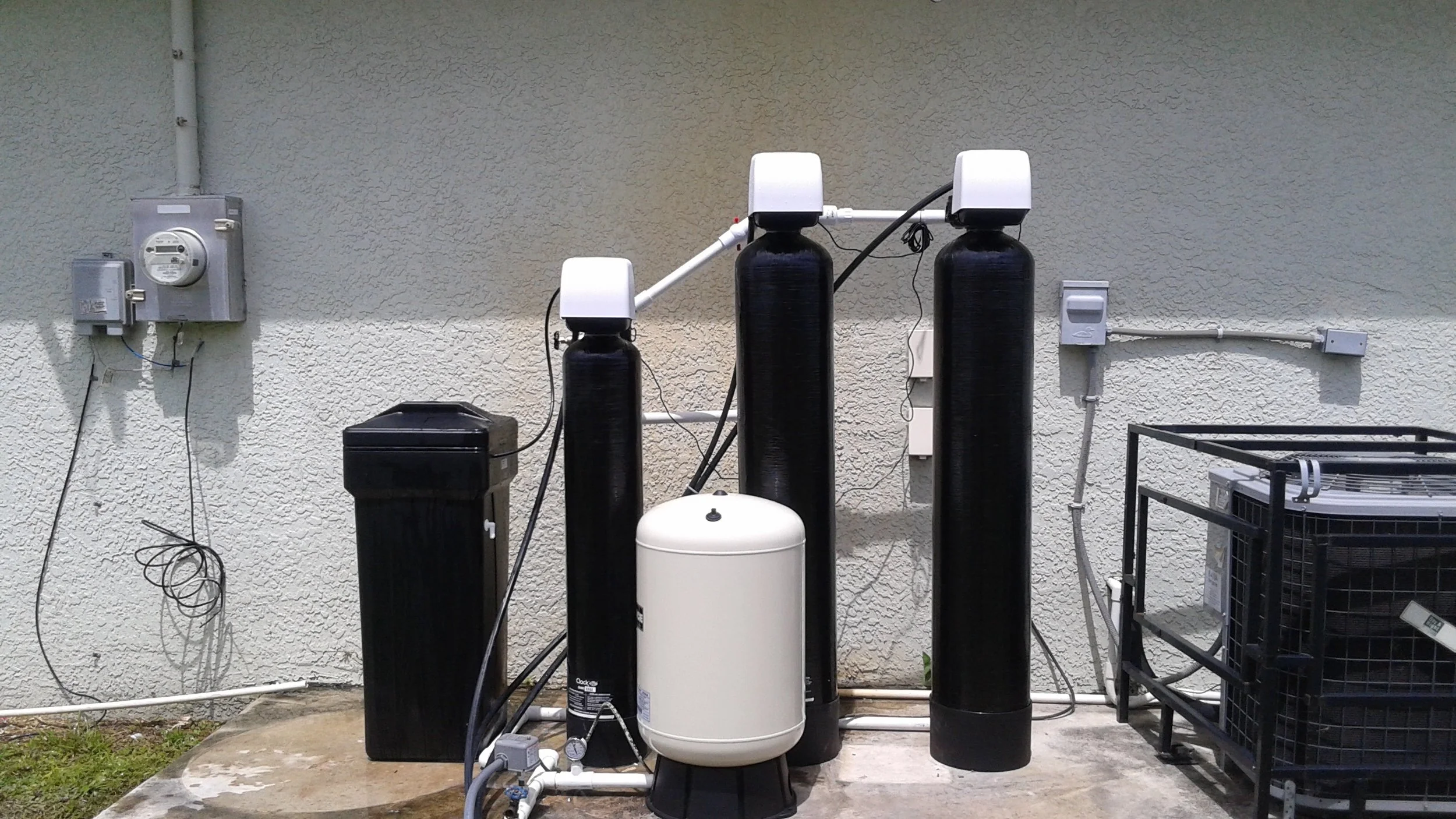 Whole home water treatment with aeration, sulfur and iron filters, and a softener to remove rotten egg smell, sulfur odor, iron stains, hardness, and bacteria. Reverse osmosis for drinking water.