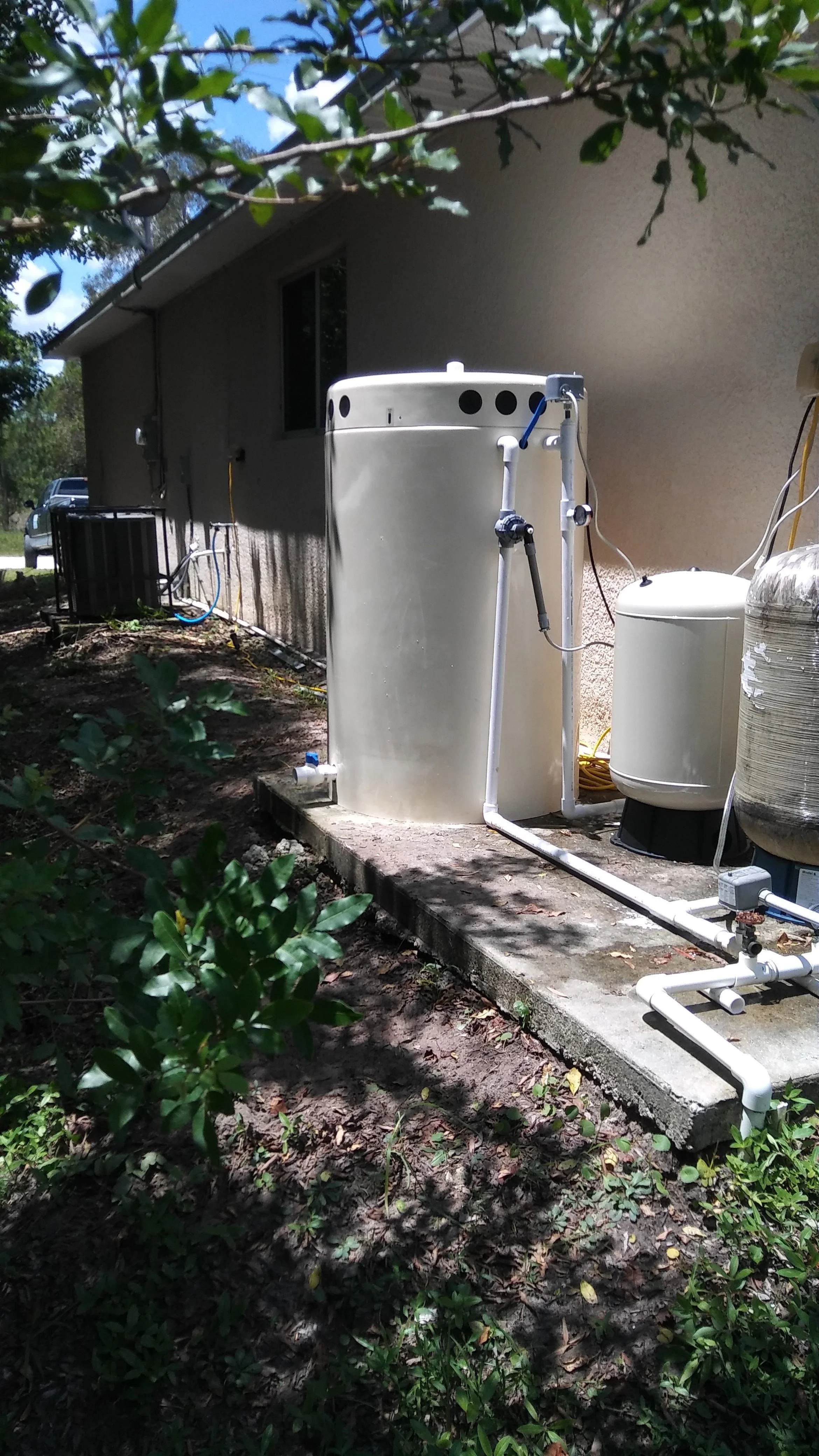 Whole house well water treatment including aeration, sulfur and iron filters, and a softener to fix rotten egg smell, sulfur odor, iron stains, hardness, and bacteria. RO for drinking water.