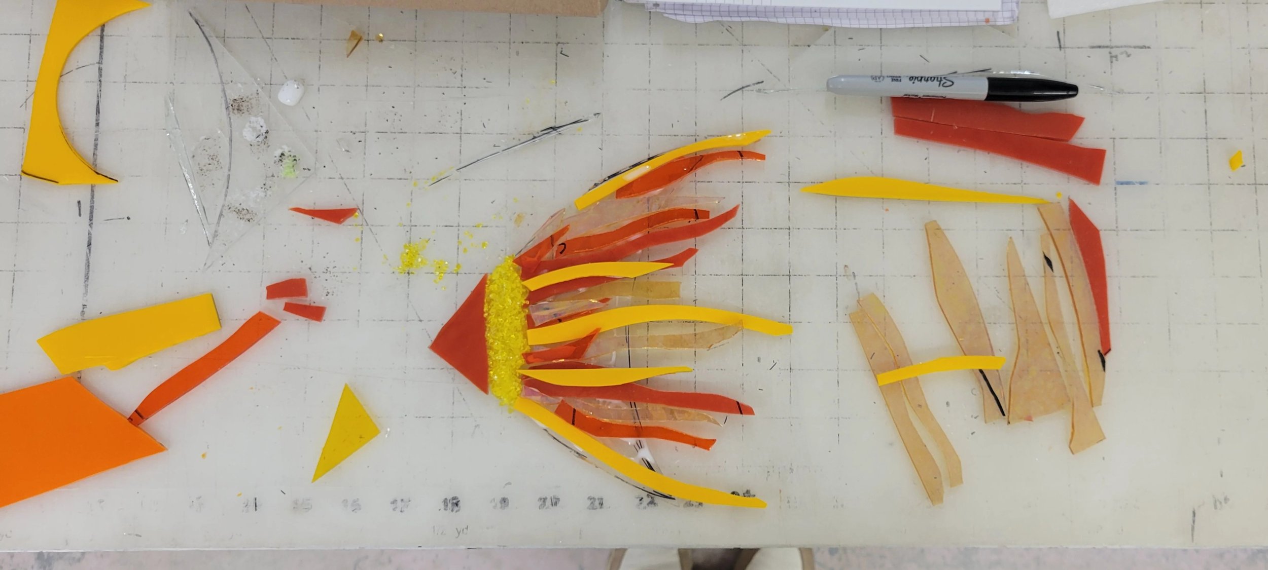 In this image I am almost done with the orange fish. Starting to add the small details. 