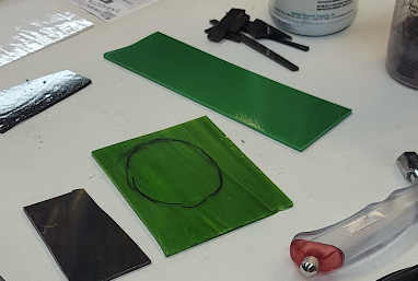 Preparing glass to get cut and shaped.