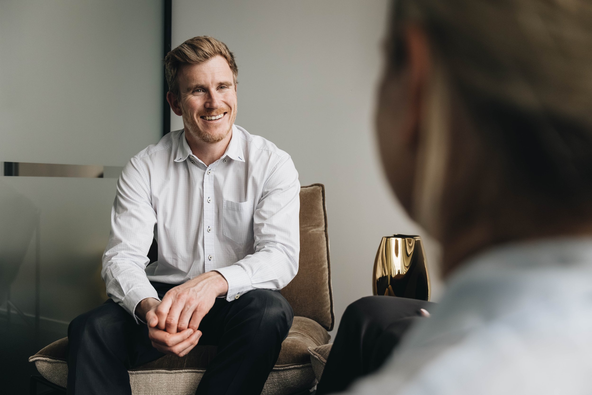 Person smiling in meeting