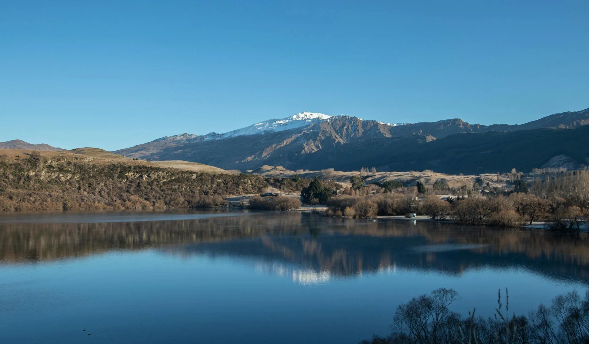 Lake with mountains in the background