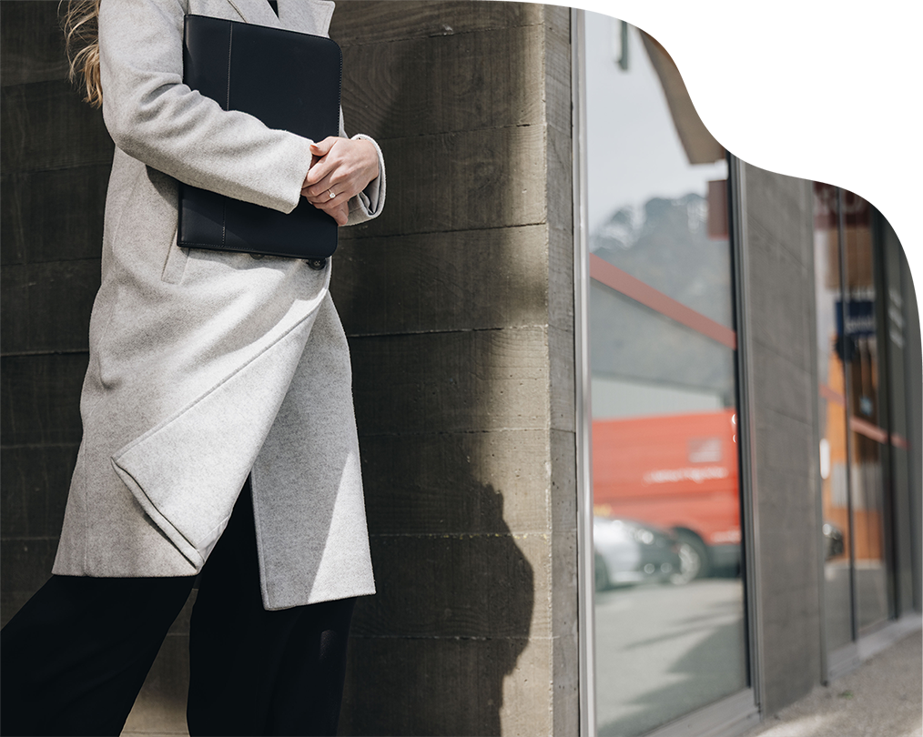 Person holding laptop