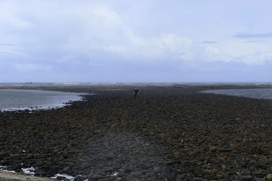 Crossing the rocks back from Mushroom reef rock pools and getting caught in stormy weather. Showing our children that spending time in nature is not always glamorous but it does give you a good story.