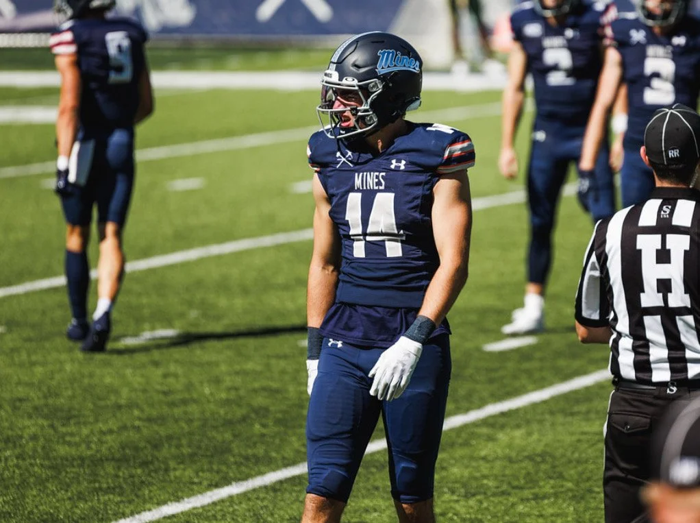 Flynn Schiele, wire receiver transfer from Colorado School of Mines to Cincinnati. Flynn in full uniform at Mines in a game.