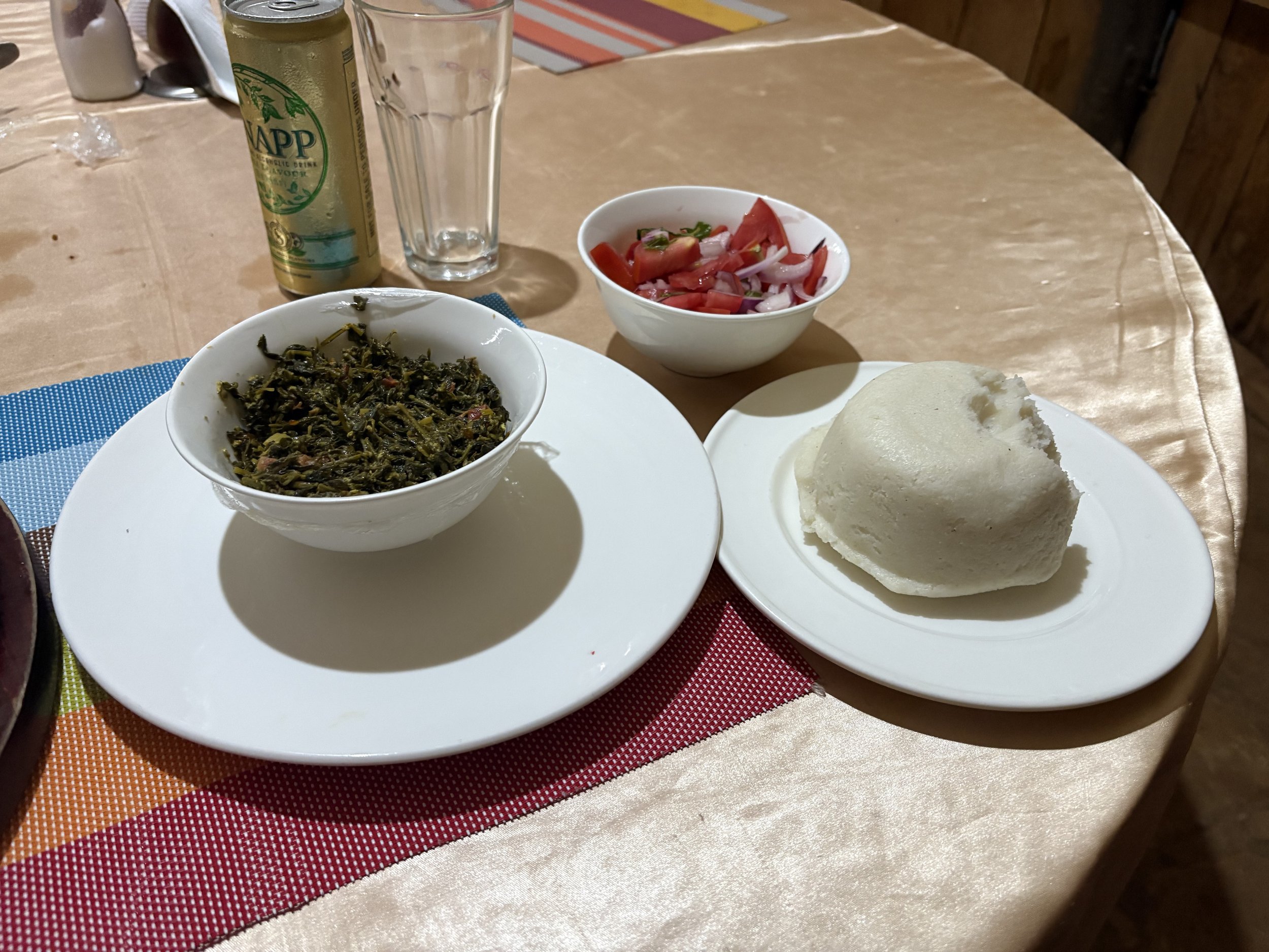 Ugali, sukumu wiki, and kachumbari from Kenya.