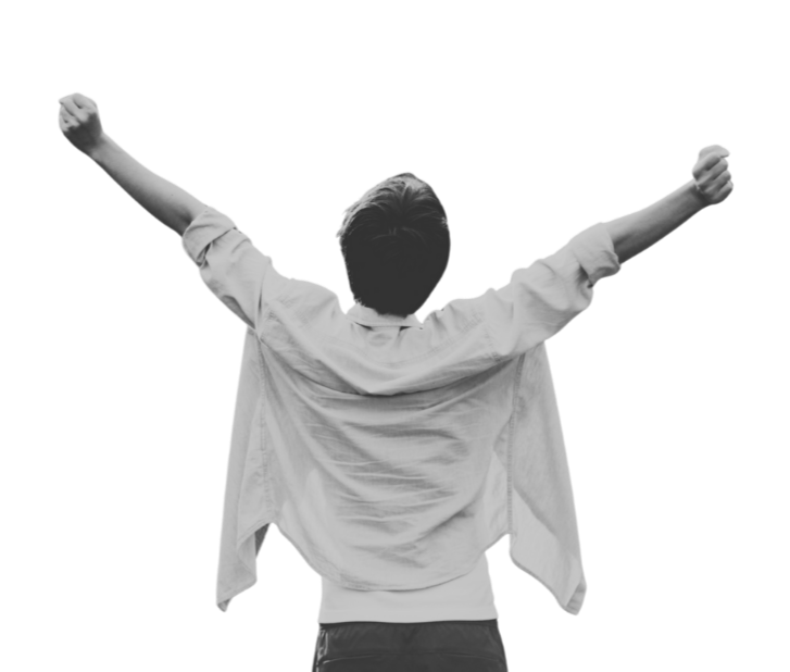 Back view of a person with arms raised in victory, wearing a light-colored shirt, on a gray background.
