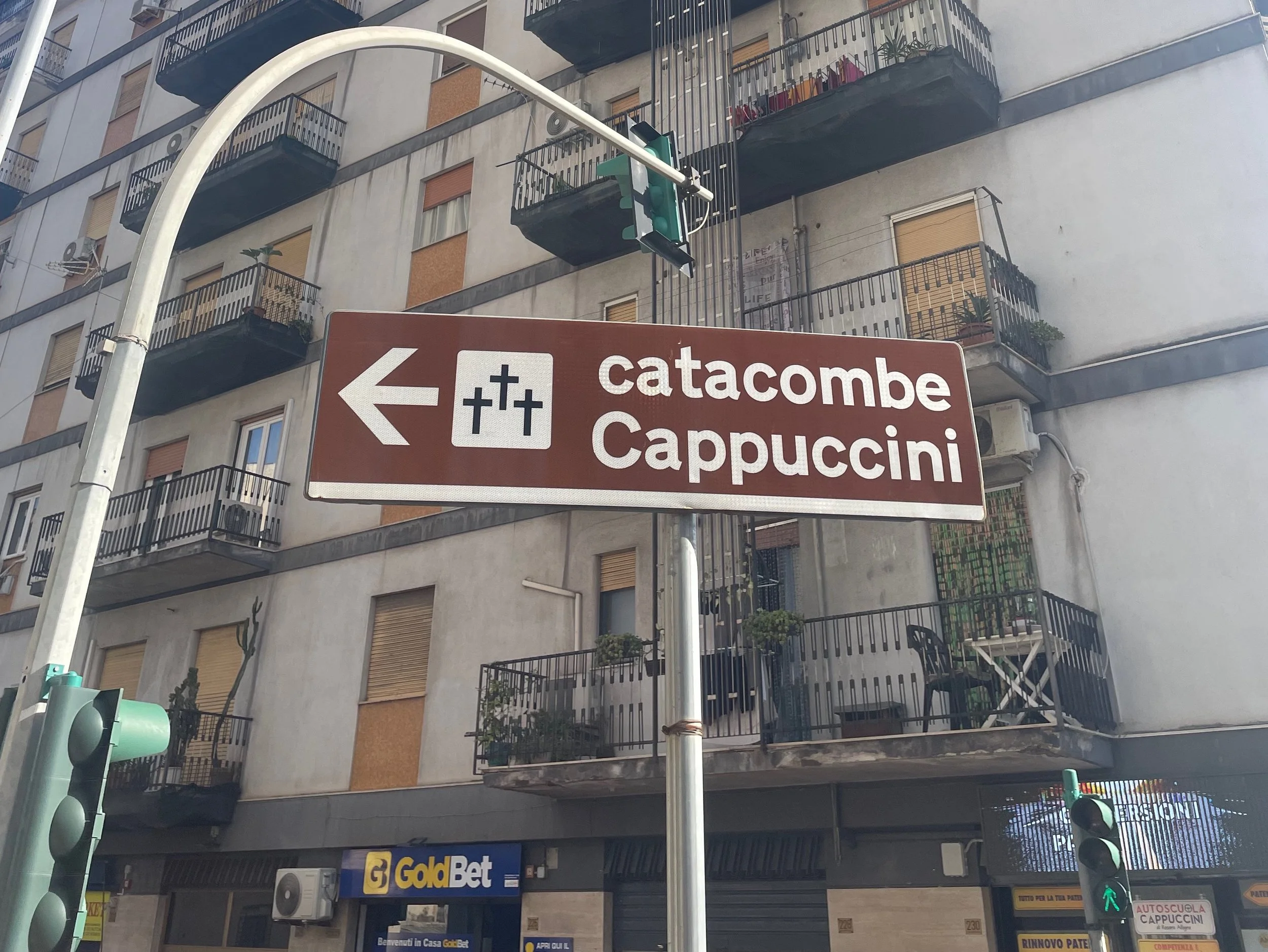 Street sign reading Catacombe Cappuccini in Palermo Sicily