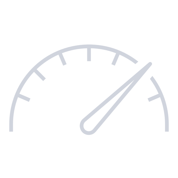 Close-up of a gauge meter with a needle pointing to the high end.