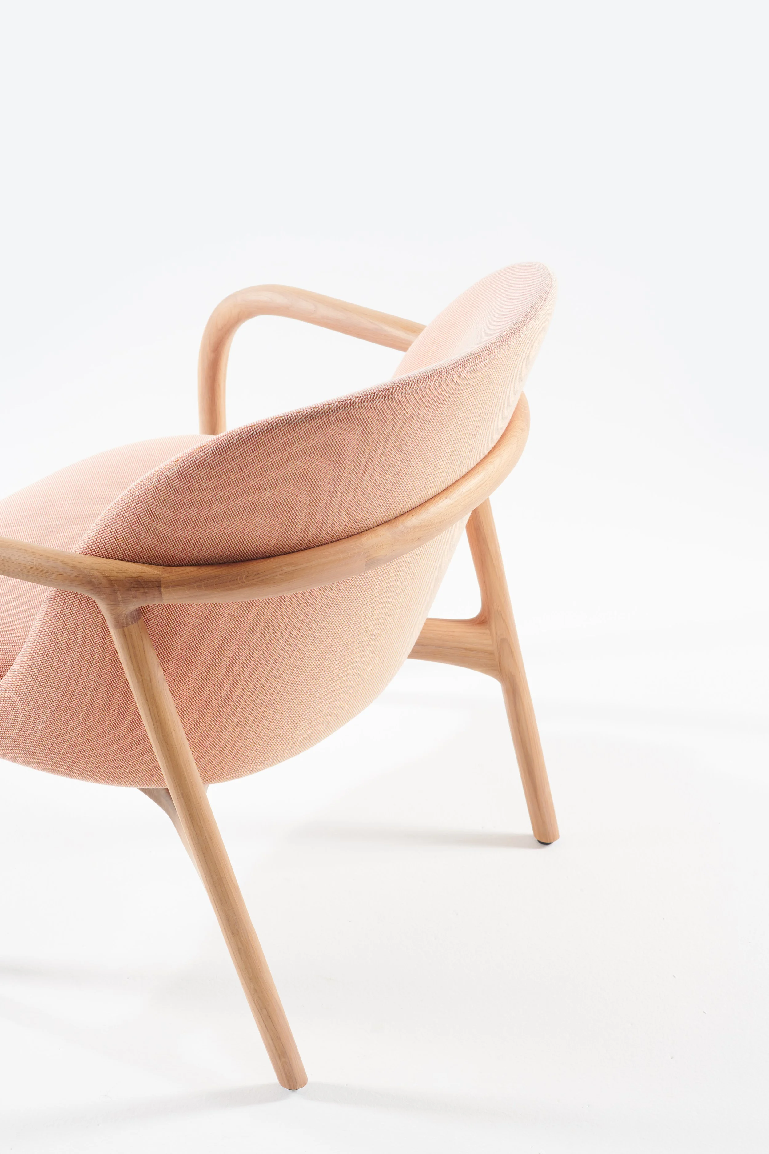 Neva Lounge Trimmed low-back lounge chair with wooden frame