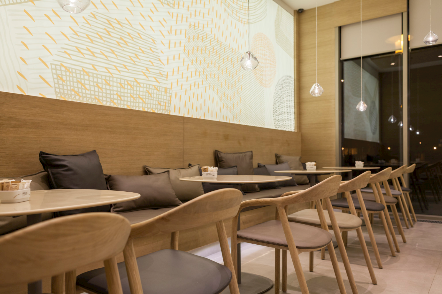 Multiple views of Neva Chair highlighting elegant curves and ergonomic form