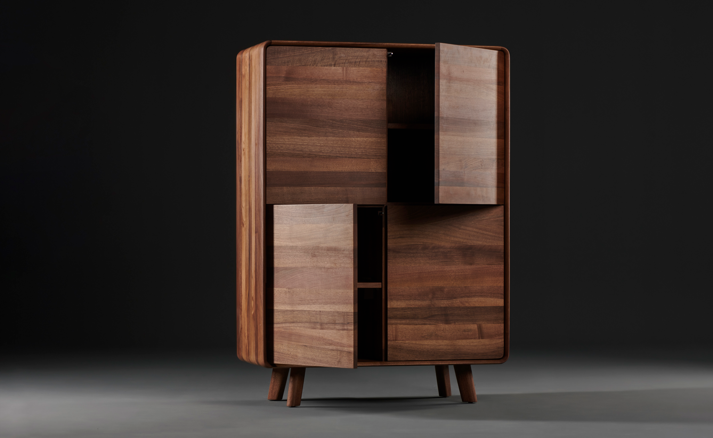 Neva Highboard with flowing wooden lines and elegant design - designed by Regular Company for Artisan