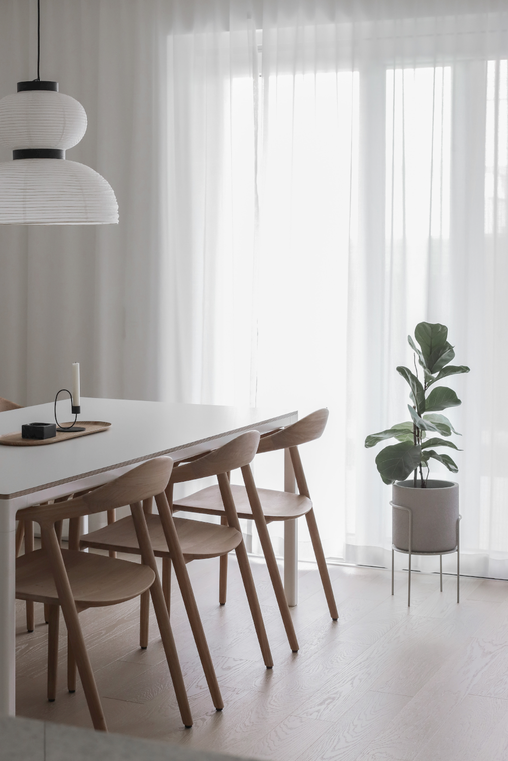 Multiple views of Neva Chair highlighting elegant curves and ergonomic form