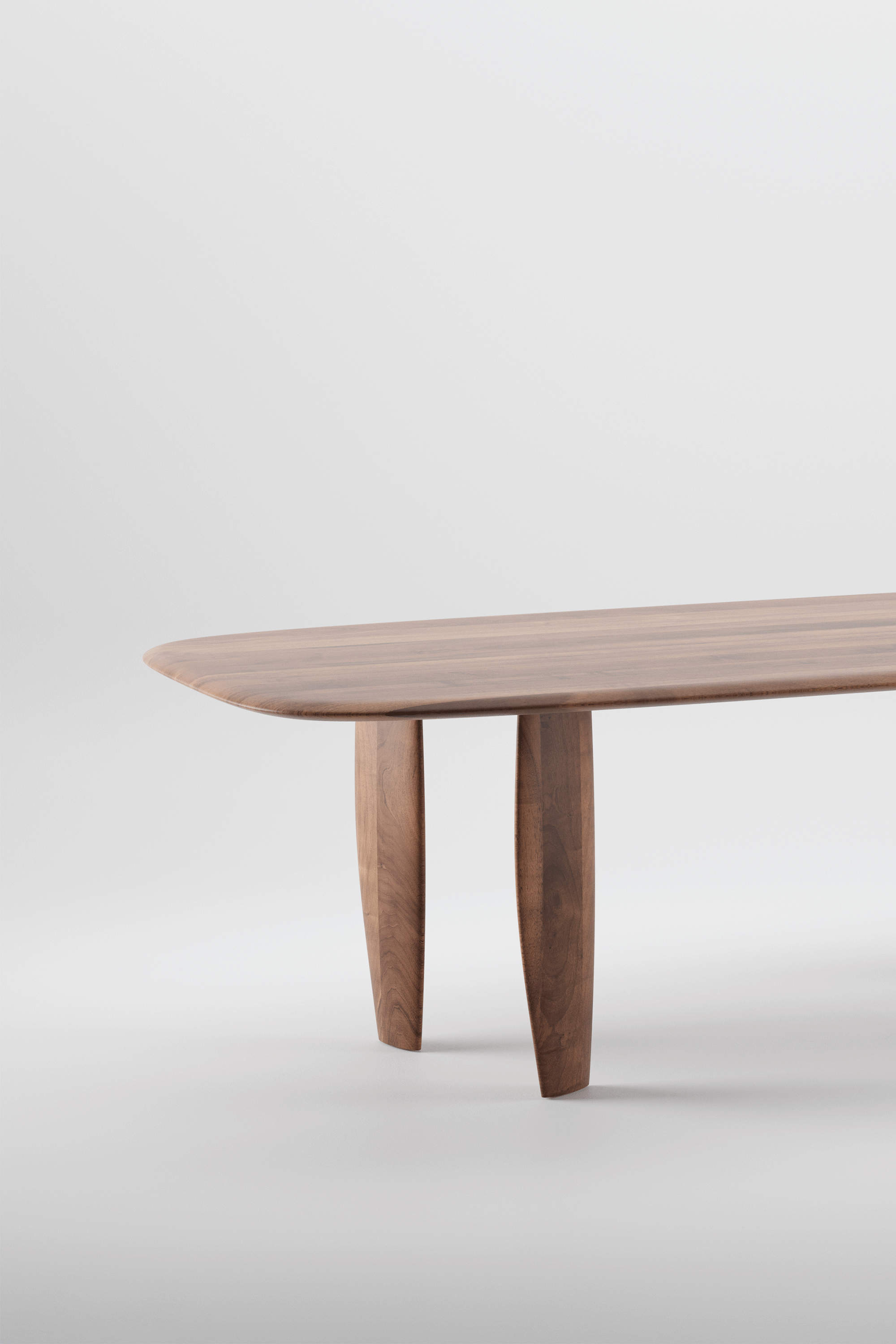 Nilu Table with clean flowing lines and wooden structure