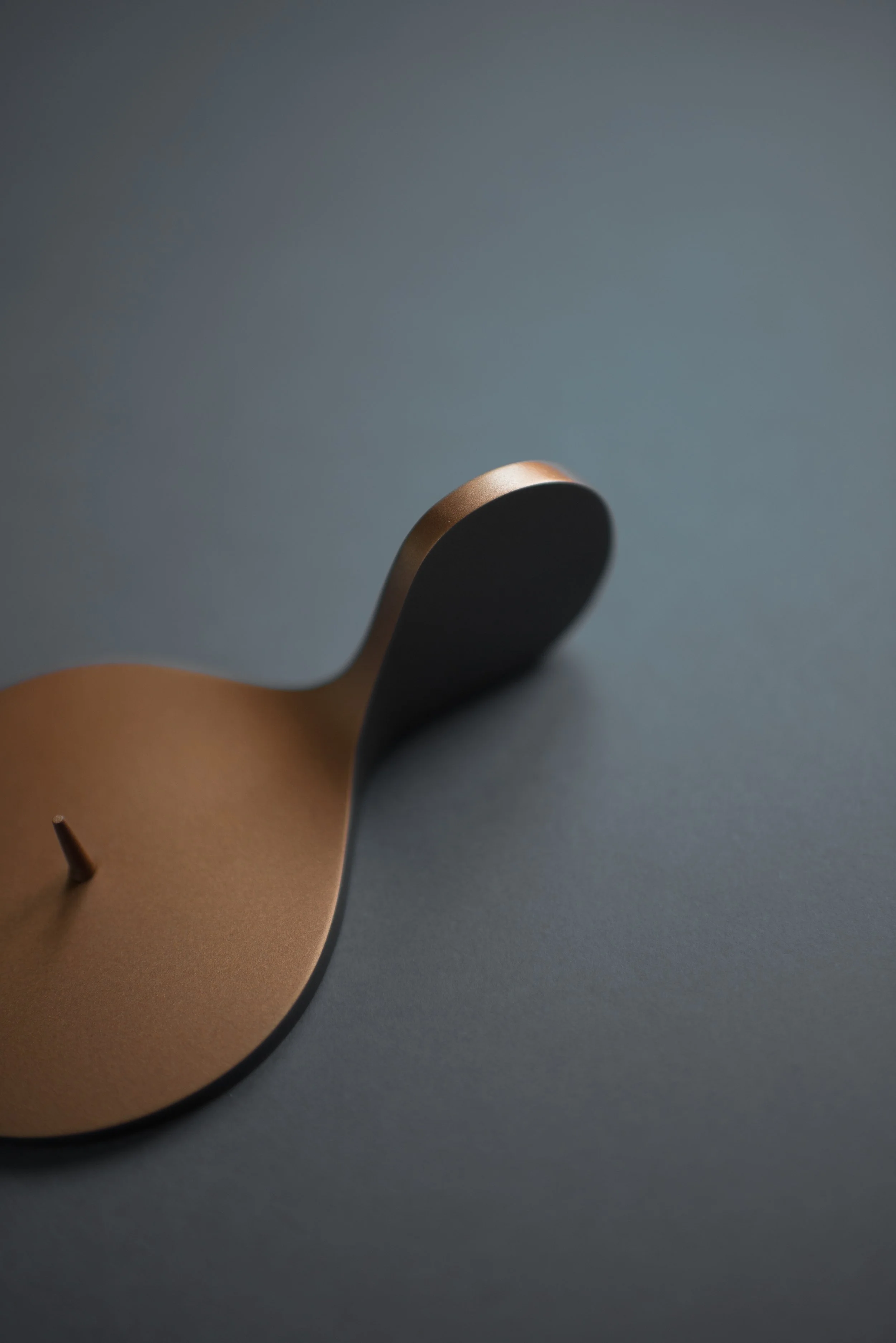 Modern candleholder design evoking traditional forms