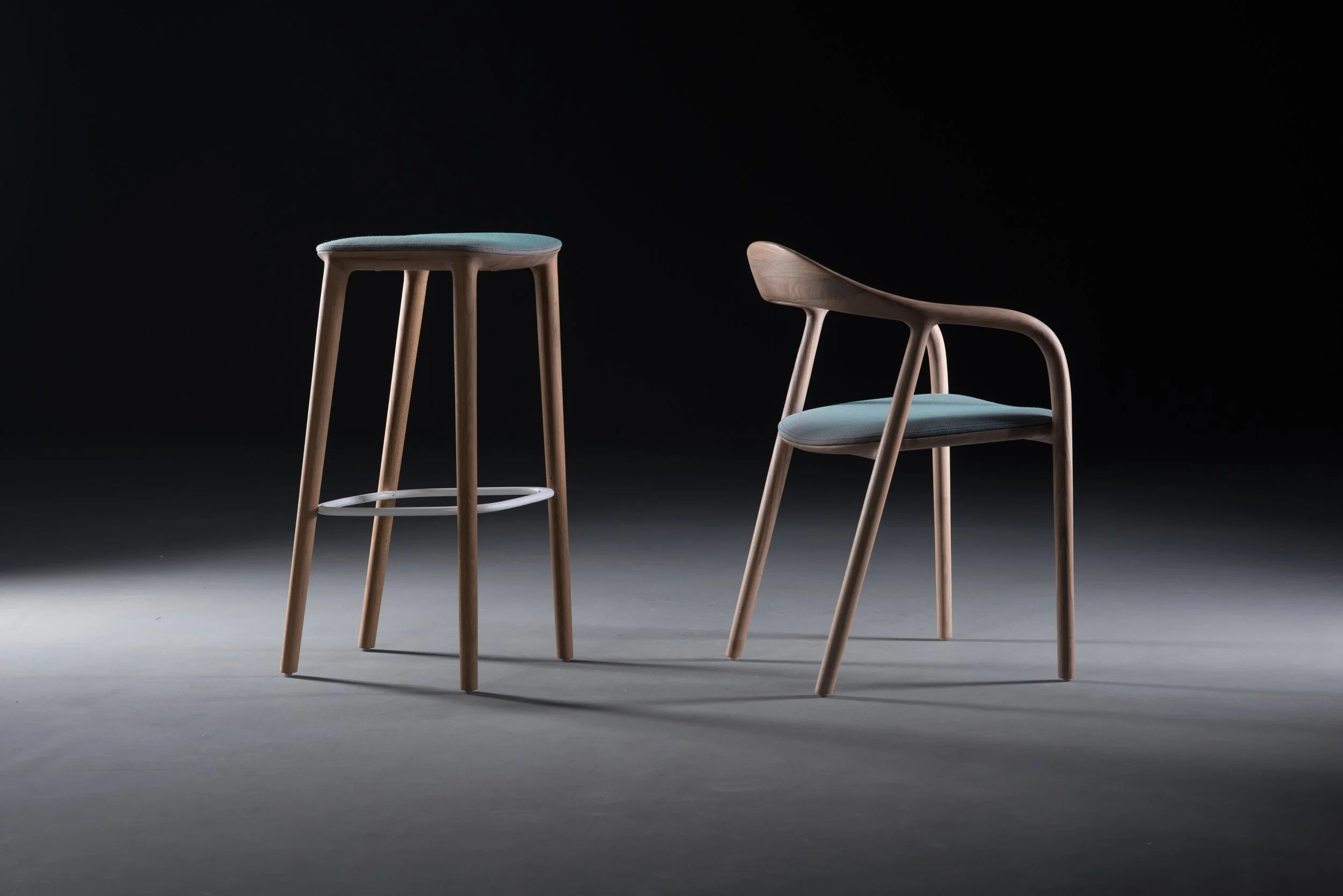 Neva furniture collection featuring the original Neva chair and later designs in solid wood.