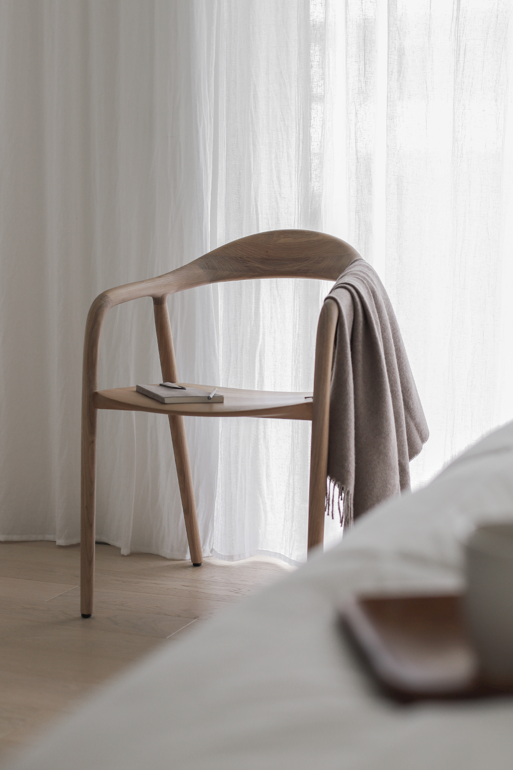 Multiple views of Neva Chair highlighting elegant curves and ergonomic form