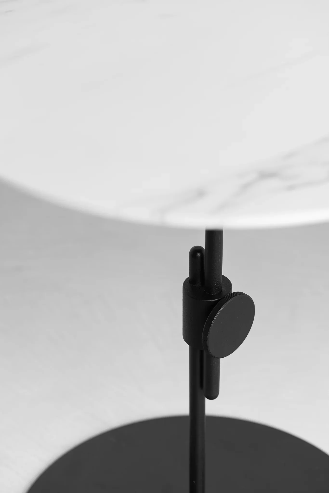 Adjustable side table featuring visible technical details