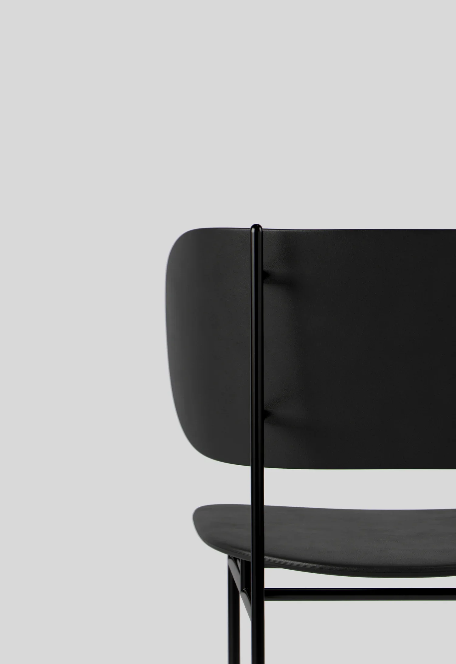 h.3 chair with geometric metal structure and soft upholstered seat