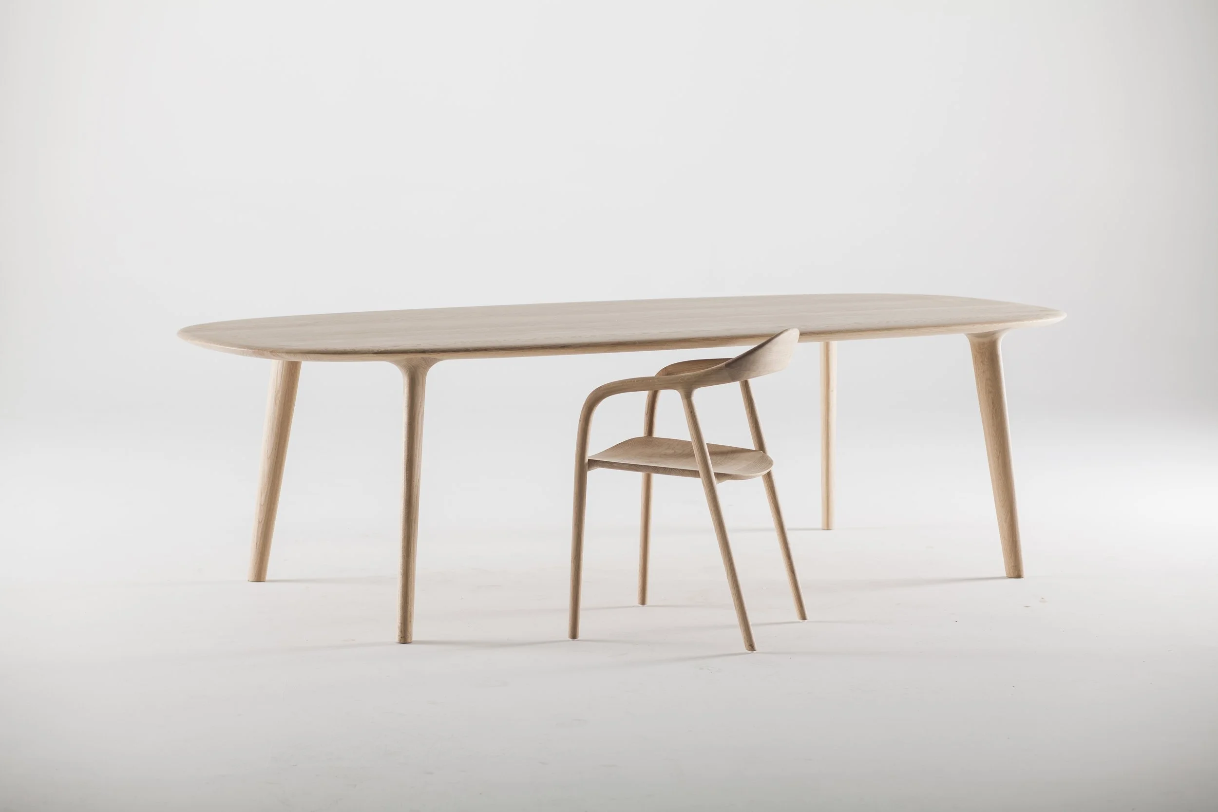 Luc Table by Regular Company – Elegant Solid Wood Dining Table with Fluid Form design for Artisan.jpg