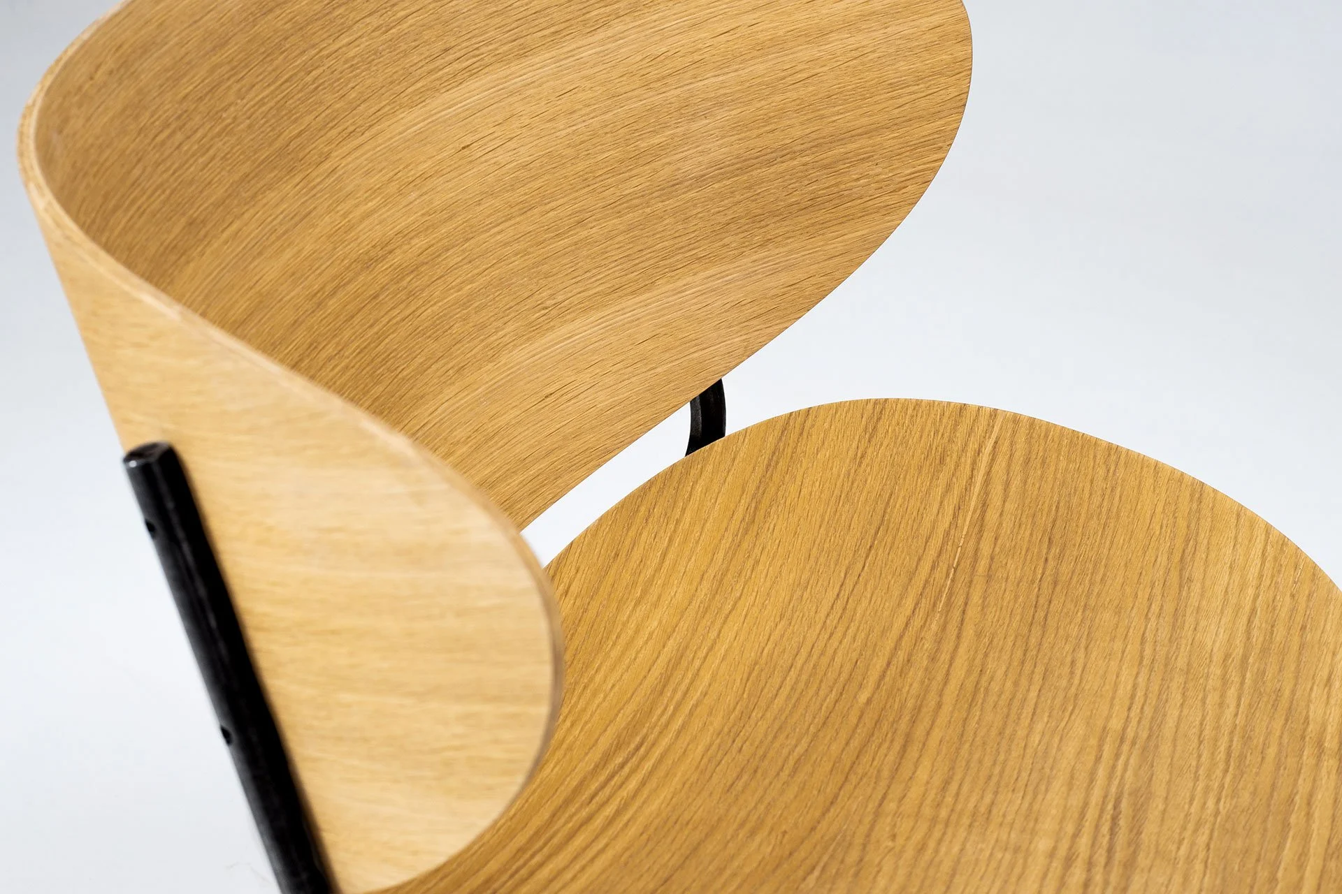 Bolta collection chair showcasing fluid, human-centered geometry