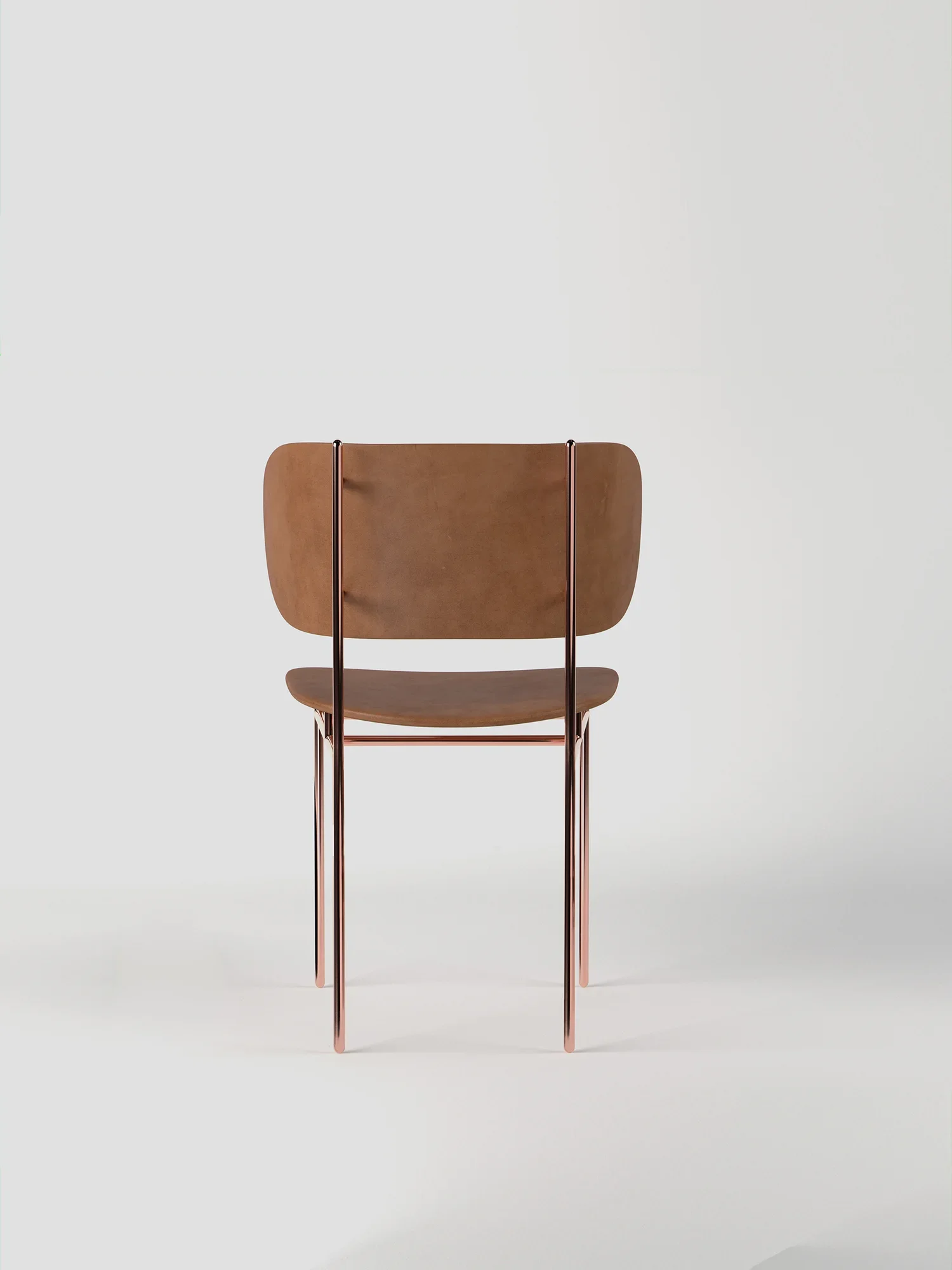 Design chair emphasizing contrast between structure and comfort
